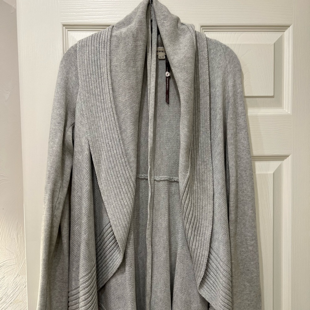 Woman’s open cardigan with belt